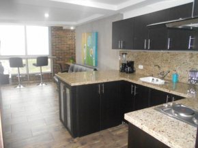Гостиница Apartasuites AV  Медельин